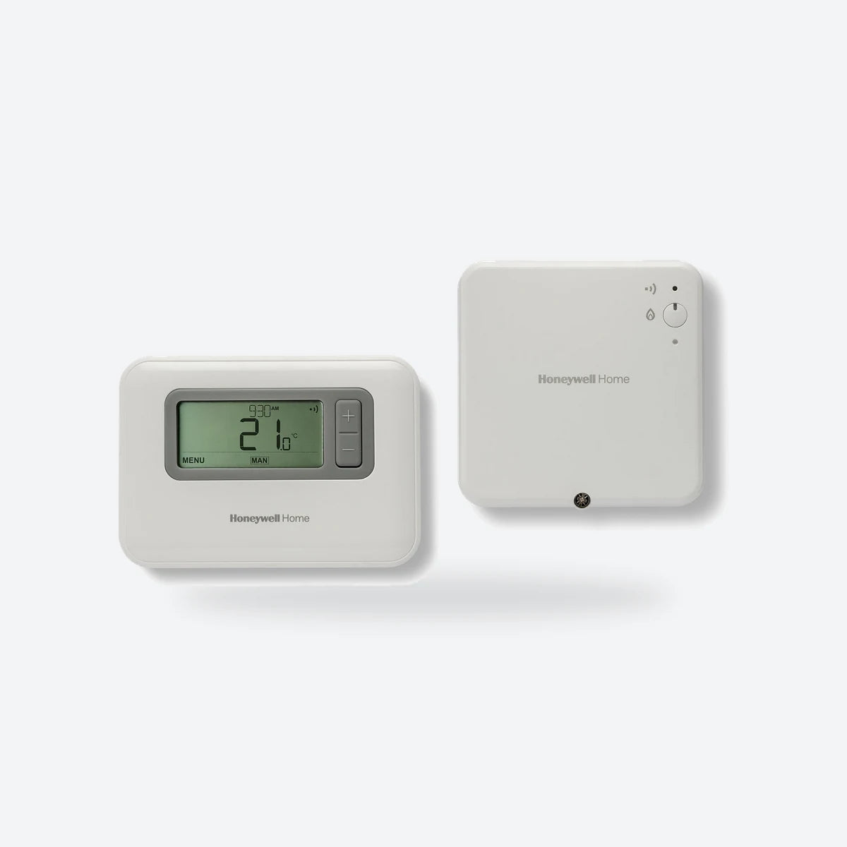 Honeywell Home T3R wireless programmable thermostat with its receiver