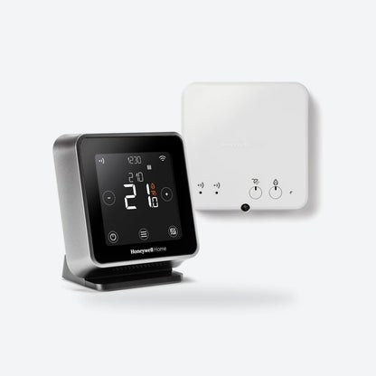 Honeywell Home T6R smart thermostat on its table stand with the hot water receiver